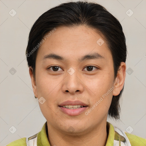 Joyful asian young-adult male with short  brown hair and brown eyes