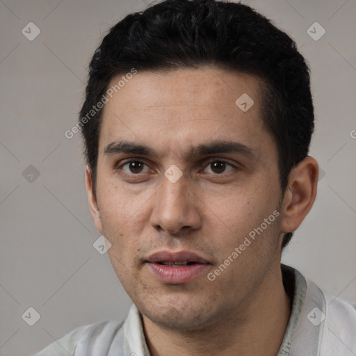 Neutral white adult male with short  black hair and brown eyes