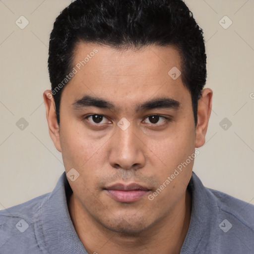 Neutral latino young-adult male with short  black hair and brown eyes