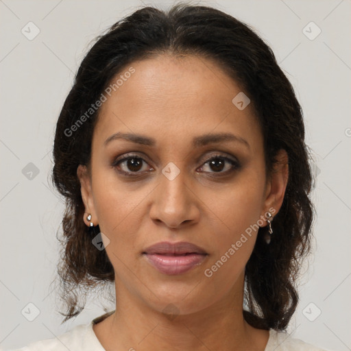 Joyful black young-adult female with medium  brown hair and brown eyes