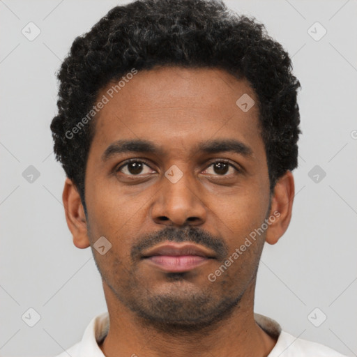 Neutral latino young-adult male with short  black hair and brown eyes