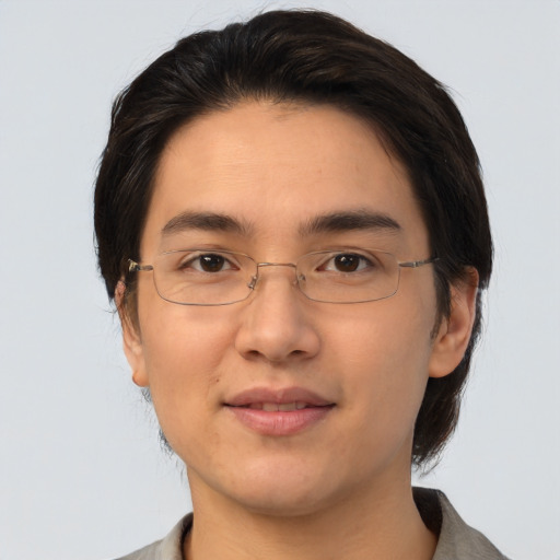 Joyful white adult male with medium  brown hair and brown eyes