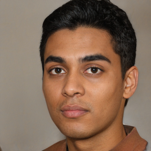 Neutral latino young-adult male with short  black hair and brown eyes