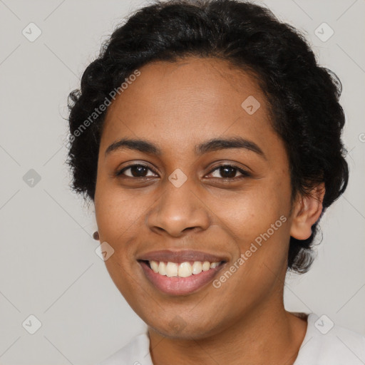 Joyful latino young-adult female with short  black hair and brown eyes