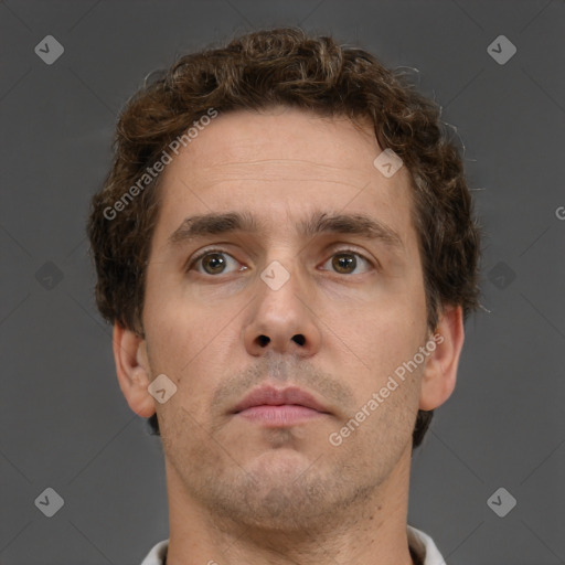 Neutral white adult male with short  brown hair and brown eyes