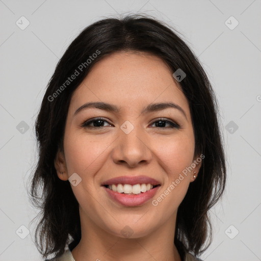 Joyful latino young-adult female with medium  brown hair and brown eyes