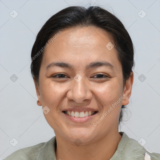 Joyful white adult female with short  brown hair and brown eyes