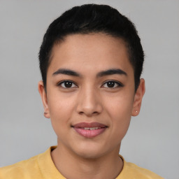 Joyful asian young-adult female with short  black hair and brown eyes