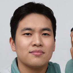 Neutral asian young-adult male with short  brown hair and brown eyes