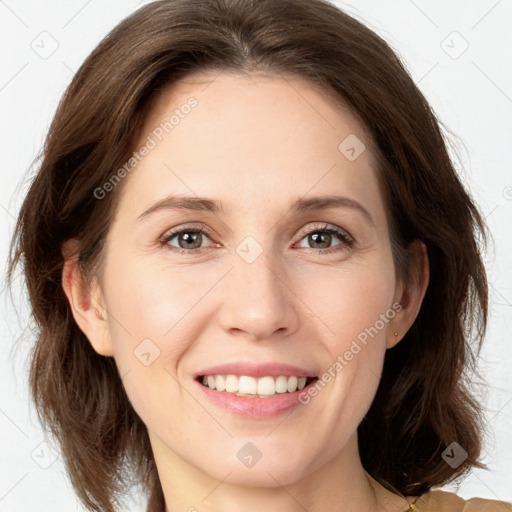 Joyful white young-adult female with medium  brown hair and grey eyes