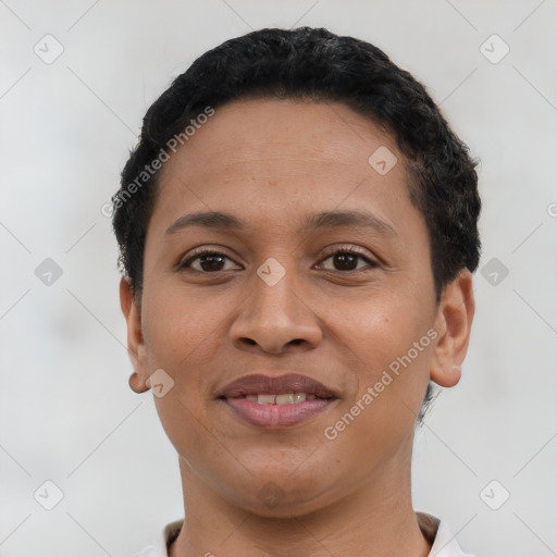 Joyful latino young-adult female with short  brown hair and brown eyes