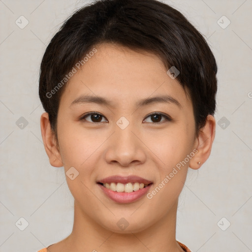 Joyful asian young-adult female with short  brown hair and brown eyes