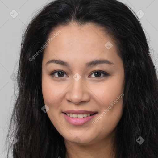 Joyful asian young-adult female with long  brown hair and brown eyes