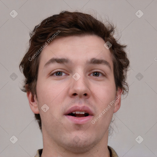 Neutral white young-adult male with short  brown hair and grey eyes