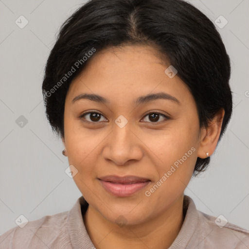 Joyful latino young-adult female with medium  brown hair and brown eyes