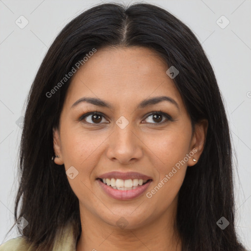 Joyful latino young-adult female with long  brown hair and brown eyes