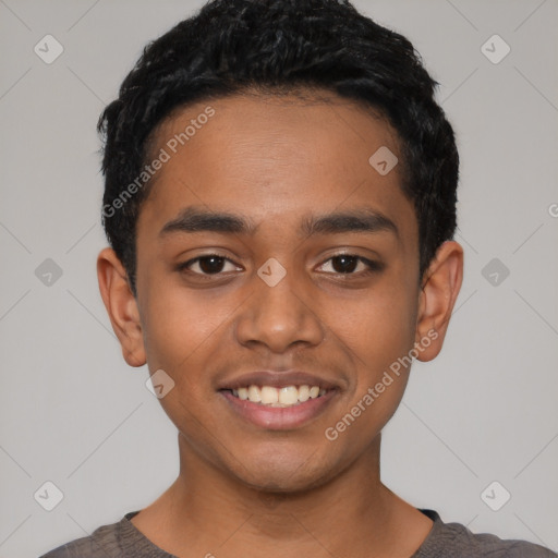 Joyful latino young-adult male with short  black hair and brown eyes