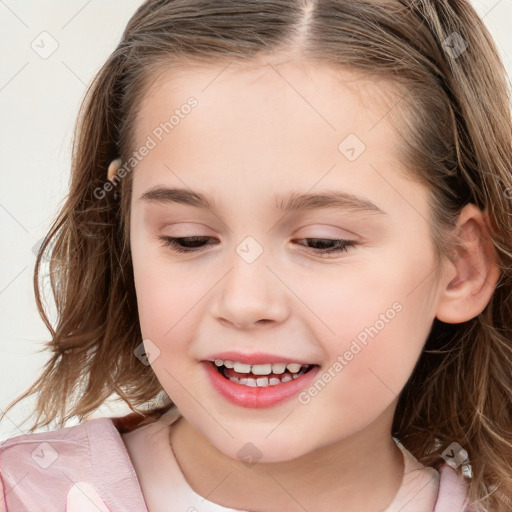 Joyful white child female with long  brown hair and brown eyes