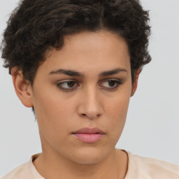 Neutral white young-adult female with short  brown hair and brown eyes