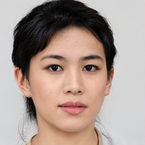 Neutral asian young-adult female with medium  black hair and brown eyes
