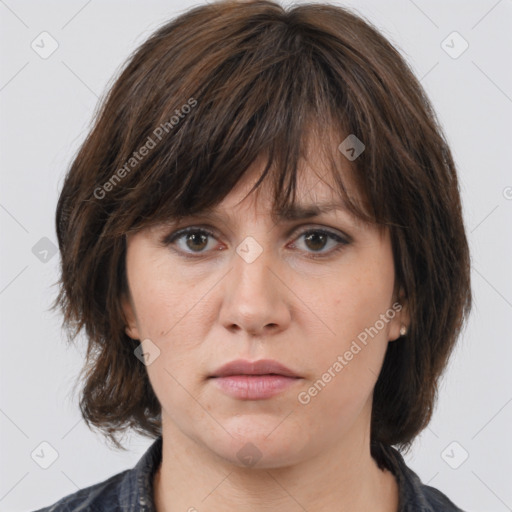 Neutral white young-adult female with medium  brown hair and grey eyes