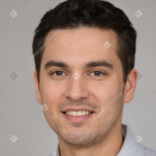 Joyful white young-adult male with short  brown hair and brown eyes