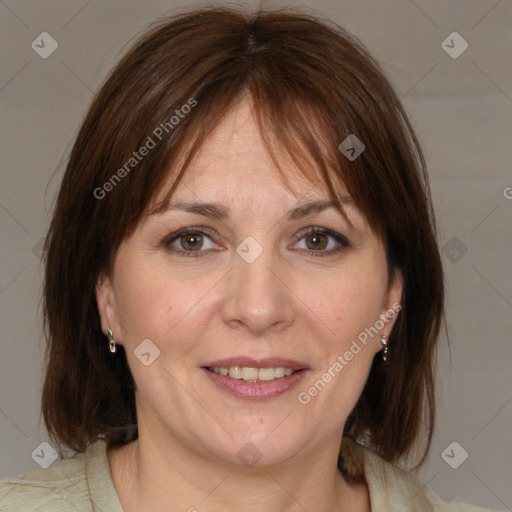 Joyful white adult female with medium  brown hair and brown eyes