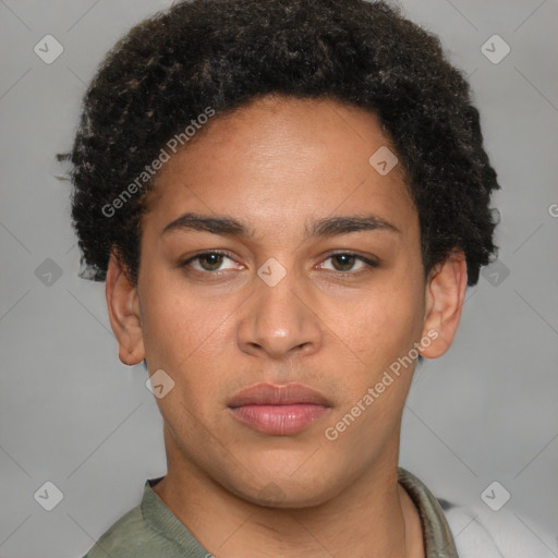 Joyful latino young-adult male with short  brown hair and brown eyes