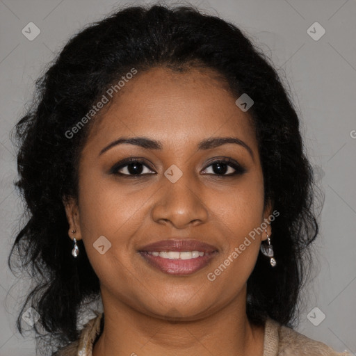 Joyful black young-adult female with long  brown hair and brown eyes