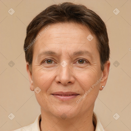 Joyful white adult female with short  brown hair and brown eyes