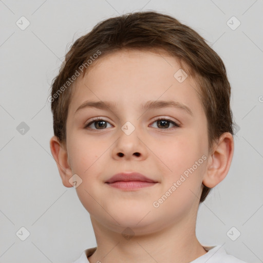 Joyful white child female with short  brown hair and brown eyes