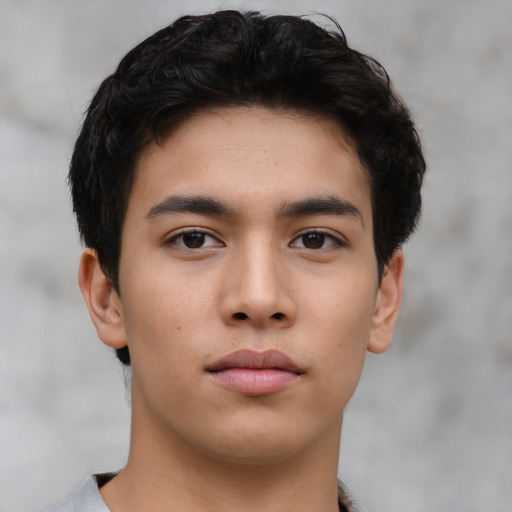 Neutral asian young-adult male with short  brown hair and brown eyes