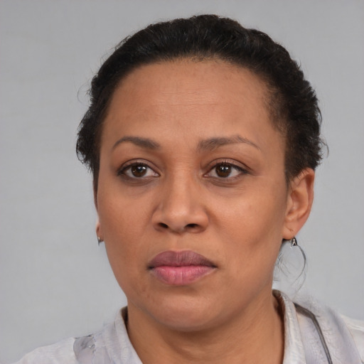 Neutral black adult female with short  brown hair and brown eyes
