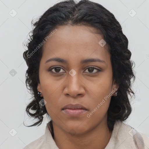 Neutral black young-adult female with long  brown hair and brown eyes