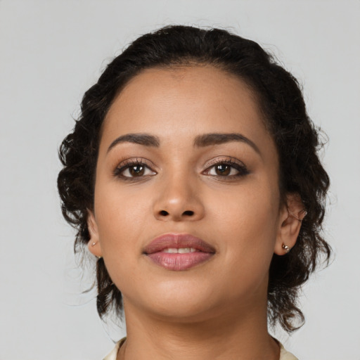 Neutral latino young-adult female with medium  brown hair and brown eyes