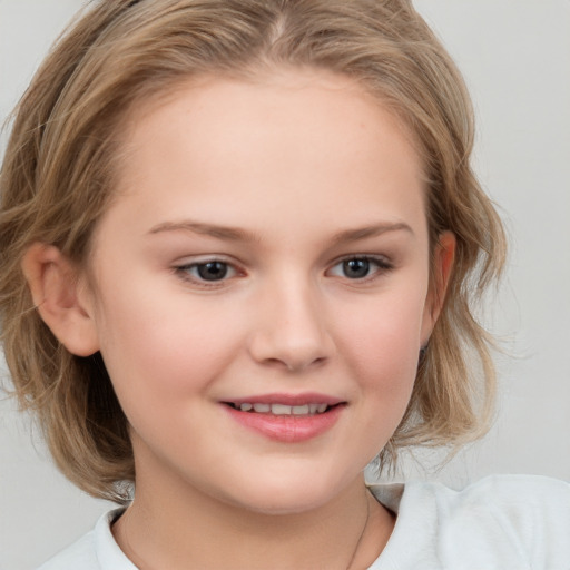 Joyful white child female with medium  brown hair and brown eyes