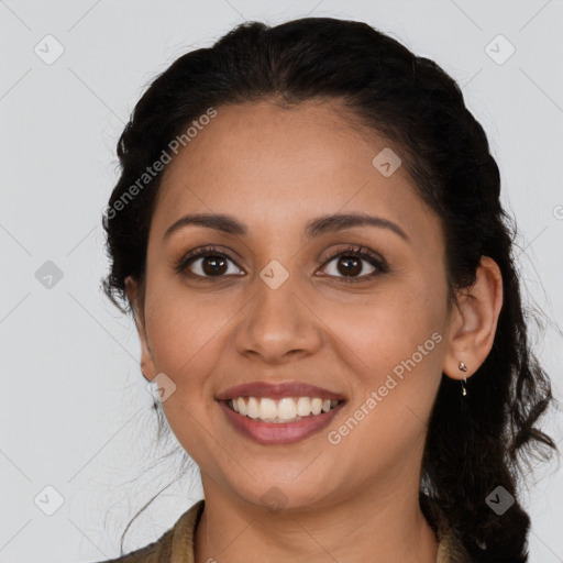 Joyful latino young-adult female with long  brown hair and brown eyes