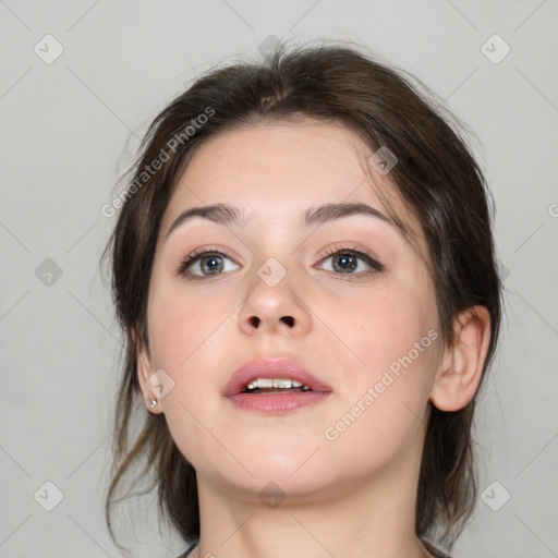 Neutral white young-adult female with medium  brown hair and brown eyes