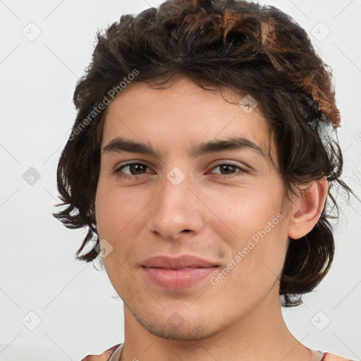 Joyful white young-adult male with medium  brown hair and brown eyes