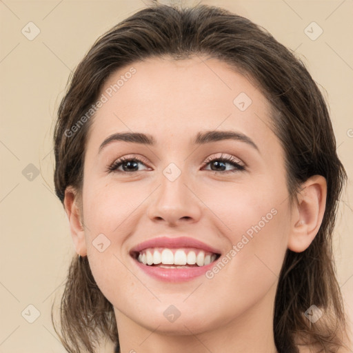 Joyful white young-adult female with medium  brown hair and brown eyes