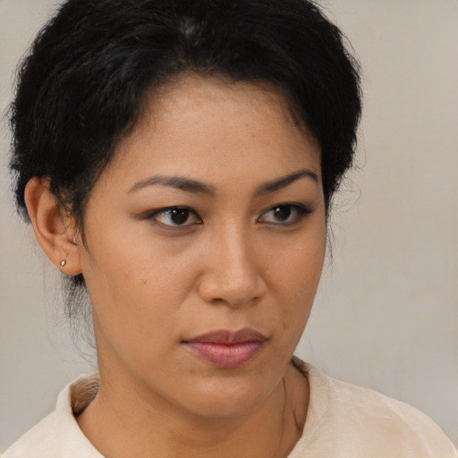 Neutral latino young-adult female with short  brown hair and brown eyes