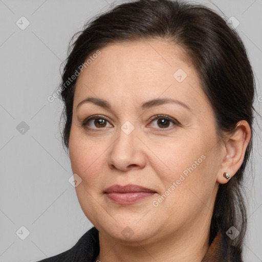 Joyful white adult female with medium  brown hair and brown eyes