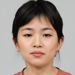 Neutral asian young-adult female with medium  brown hair and brown eyes