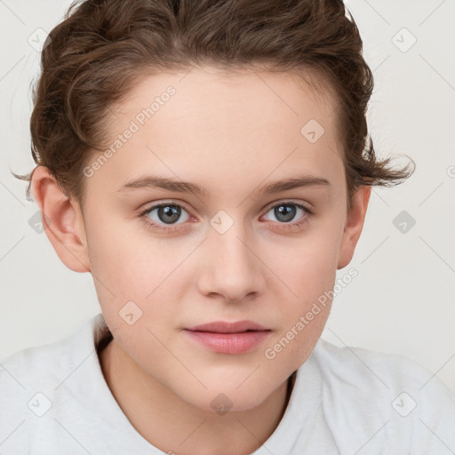 Joyful white child female with short  brown hair and blue eyes