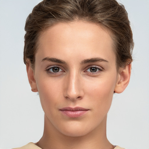 Neutral white young-adult female with short  brown hair and brown eyes