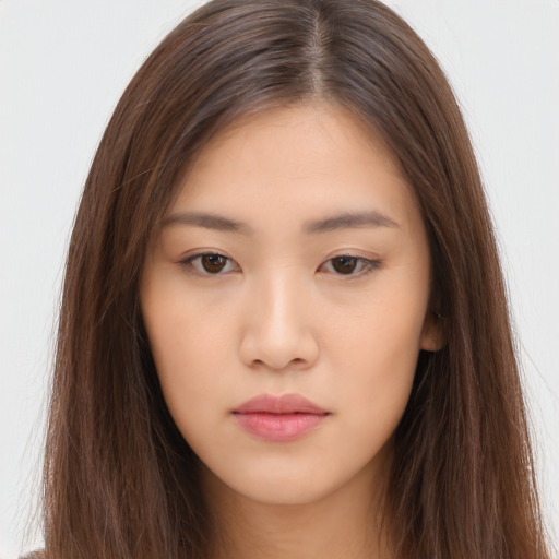 Neutral asian young-adult female with long  brown hair and brown eyes