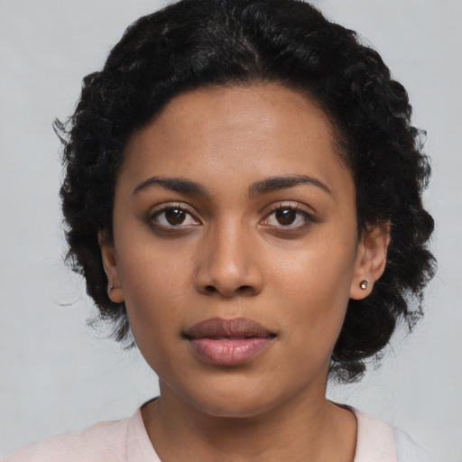 Neutral latino young-adult female with short  black hair and brown eyes