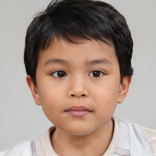 Neutral asian child male with short  brown hair and brown eyes