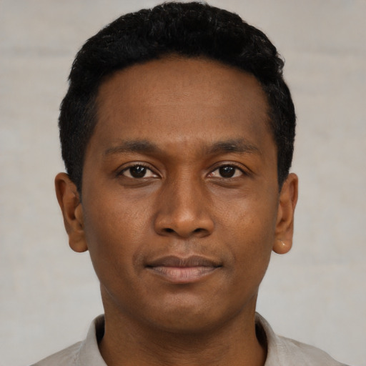 Neutral black young-adult male with short  black hair and brown eyes