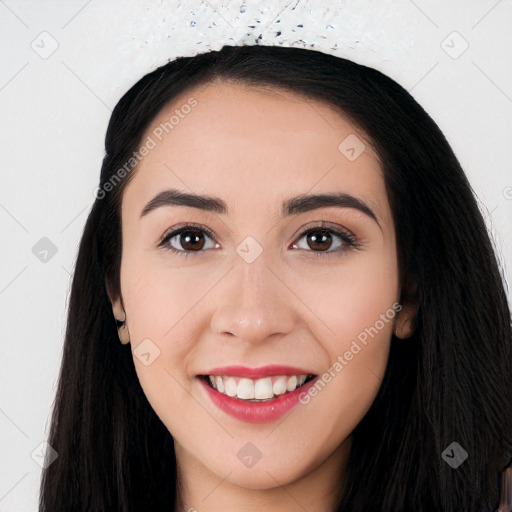 Joyful white young-adult female with long  black hair and brown eyes